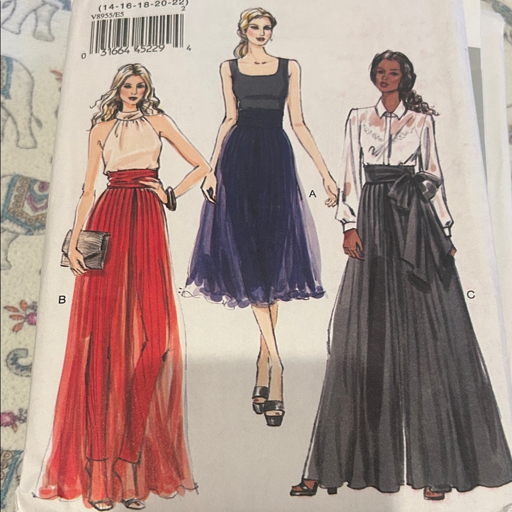 Vogue Fashion Patterns Collection with Red, Blue, and Gray Designs - Picture 7 of 7